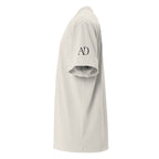 Jesus Is Lord oversized T-shirt in faded bone, left-side view